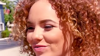 Eli Luxx is a honey with curly hair in need of a cock