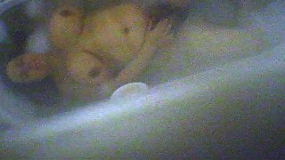 Hairy wife fucks herself in the bathroom