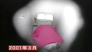 The hidden camera shoots masturbation of Asian in toilet