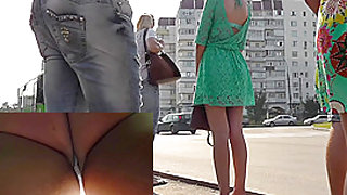 Upskirt outdoor scene with girl in sea foam dress