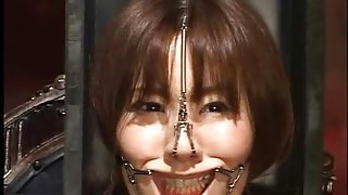 Japanese head in a box in kinky BDSM video