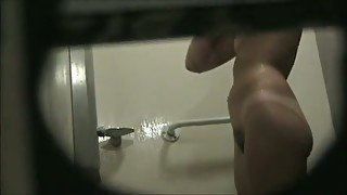 Amateur spy camera video of all naked lady taking a shower at home