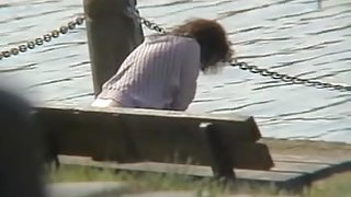 Amateur milf caught pissing on the river bank