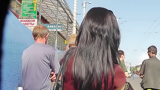 Brunette girls in Jeans are filmed upskirt in the street