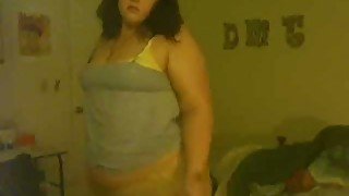 Skanky brunette BBW webcam chick strips exposing her curves