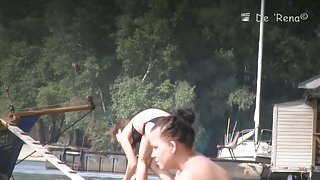 Fat amateur sits on beach voyeur cam with huge naked boobs