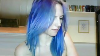 Blue haired girl plays with tits